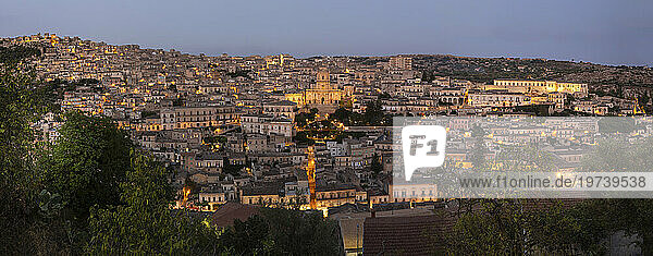 Italy  Sicily  Modica  Panoramic view of old town district at dusk