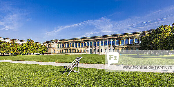 Germany  Bavaria  Munich  Empty deck chair in front of Alte Pinakothek museum