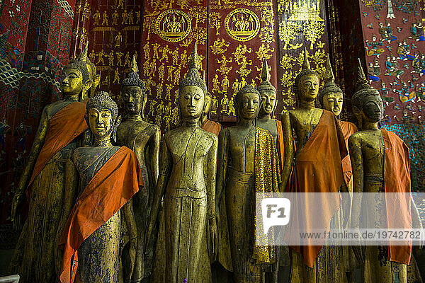 Bronze statues inside Wat Xieng Thong Monastery; Luang Prabang  Laos