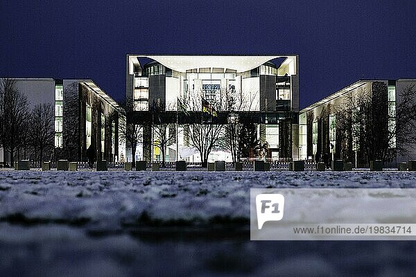 The Chancellery is illuminated against the dark evening sky Berlin  04.12.2023