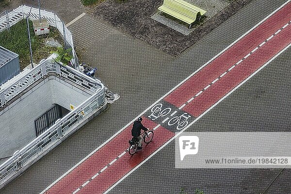 A cyclist rides on a marked cycle path in Berlin  29/08/2023