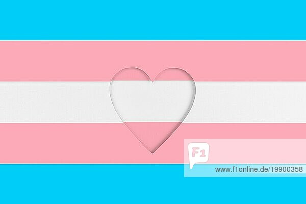Transgender Flagge als Hintergrund. Bedruckter Karton mit ausgestanzter Herzform. Ansicht von oben