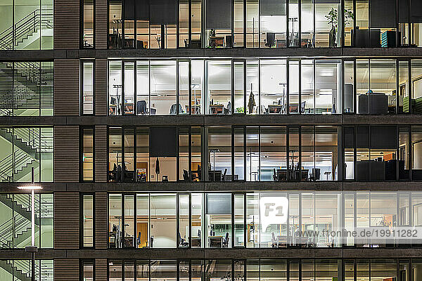 Germany  Baden-Wurttemberg  Stuttgart  Exterior of illuminated office building at night