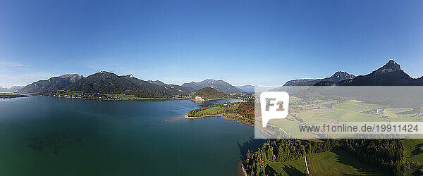 Austria  Salzburger Land  Strobl am Wolfgangsee  Drone view of lake Wolfgangsee and Blinklingmoos nature reserve