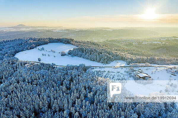 Germany  Baden-Wurttemberg  Aerial view of secluded hut in Remstal valley at winter sunset