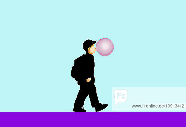 Schoolboy blowing bubble gum while walking