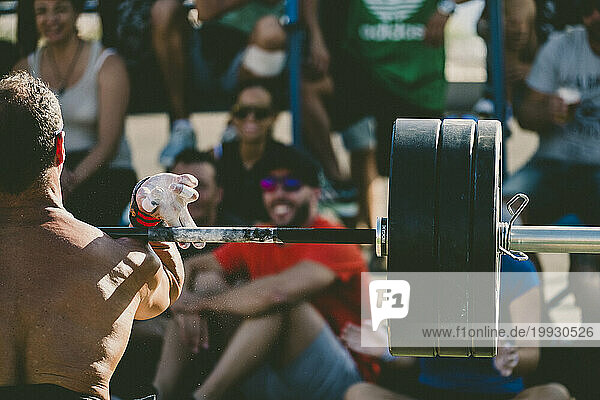 Athlete lifting weights during competition  Tenerife  Canary Islands  Spain