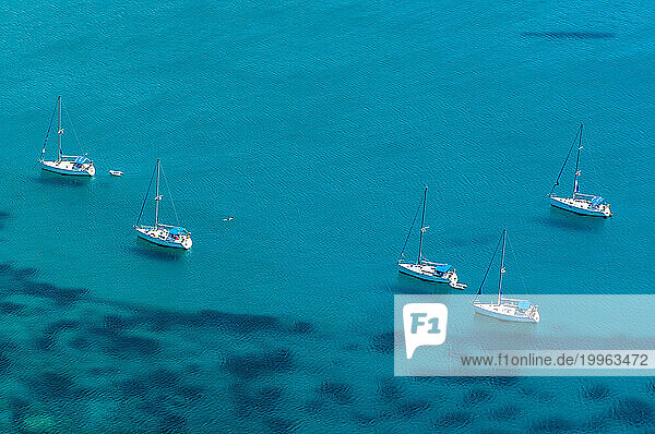 Greece  Ionian Islands  Aerial view of boats floating in blue waters of Ionian Sea in summer