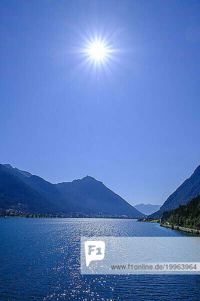 Austria  Tyrol  Pertisau  Summer sun shining over Achensee lake