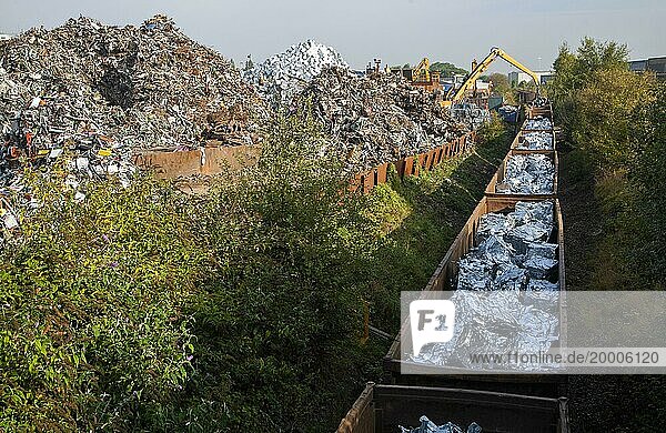 Scrap metal recycling loading train wagons with processed metals  EMR company  Swindon  England  UK