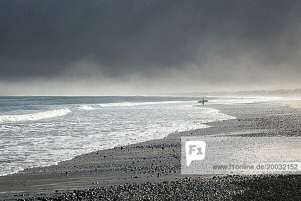 Atlantic Ocean coast beach and waves with morning sea mist  Caleta de Famara  Lanzarote  Canary islands  Spain  Europe