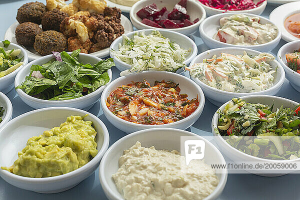 Still life variety of Israeli meze appetizers in bowls