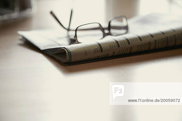 Eyeglasses on Newspaper