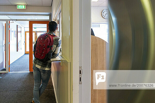 African american student going to class