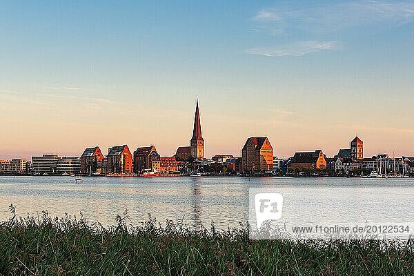 View across the Warnow to the Hanseatic city of Rostock in the evening