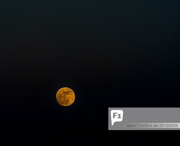 Full moon with orange hue on the night of January 1st  2018 taken with 200mm lens in Daejein  South Korea  Asia