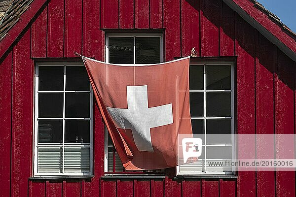Stein am Rhein  old town  wooden house  colour red  swiss flag  wind  canton Schaffhausen  Switzerland  Europe