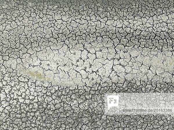 Cracked earth in the marshland near Sanlúcar de Barrameda. Aerial view. Drone shot. Cádiz province  Andalusia  Spain  Europe