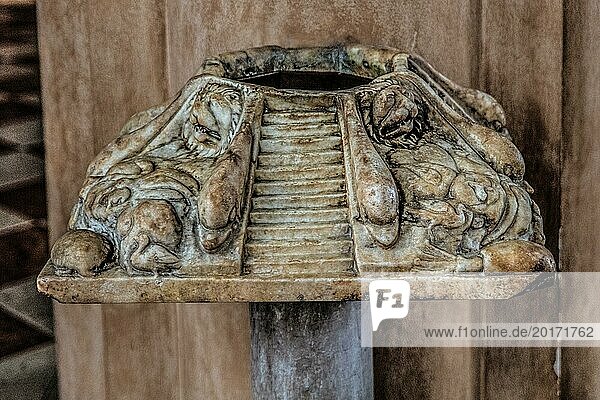Holy water font from the 1st century  Cathedral of Santo Stefano Protomartire  Basilica Paleocristiana under the cathedral Concordia Sagittaria  medieval old town  Veneto  Friuli  Italy  Concordia Sagittaria  Veneto  Italy  Europe
