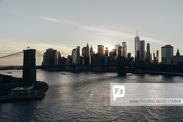 USA  New York State  New York City  Brooklyn Bridge and Manhattan skyline at sunset