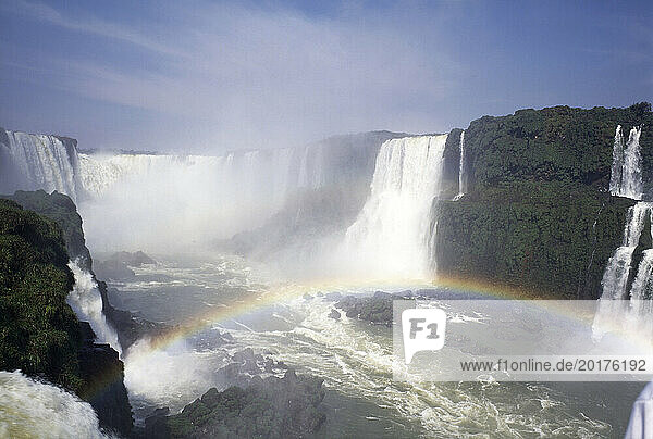 Argentina. Iguazu Falls with rainbow.