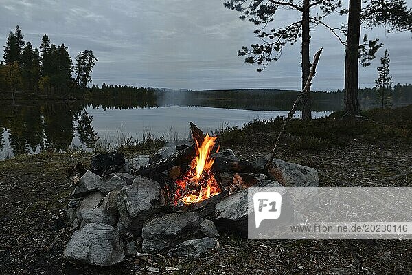 Campfire on a evening in sweden. Lagerfeuer in Schweden