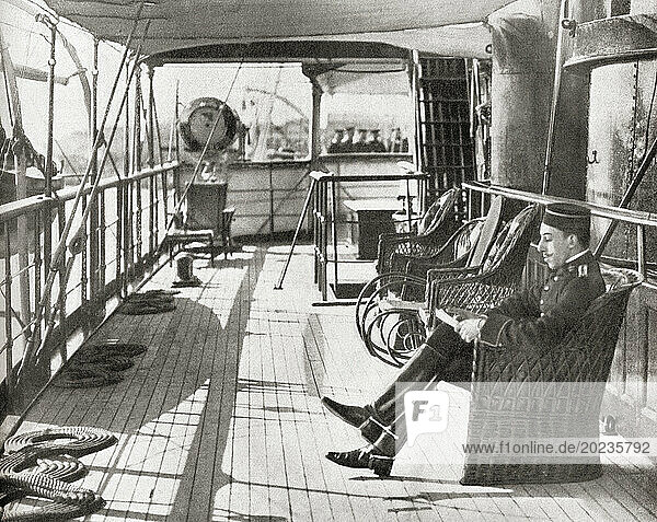 King Alfonso XIII seen here reading a letter whilst on board the Giralda  during his journey from Santander to San Sebastian in 1912. Alfonso XIII  1886 – 1941  aka El Africano or the African. King of Spain. From Mundo Grafico  published 1912.
