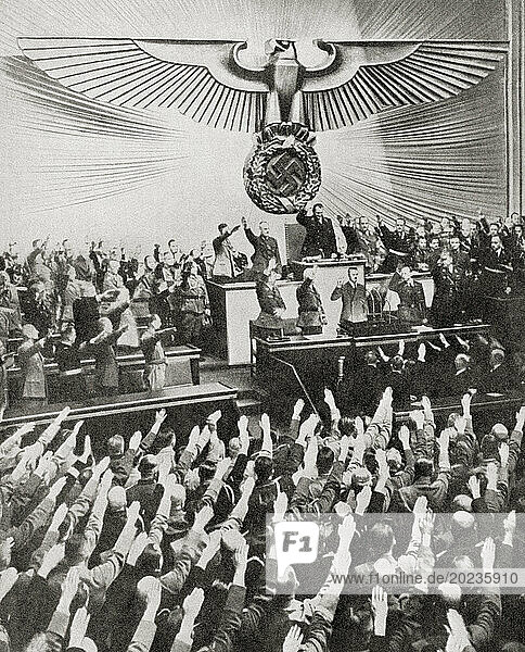 Hitler delivering his peace speech in the Reichstag  6 October 1939. Adolf Hitler  1889 – 1945. German politician  demagogue  Pan-German revolutionary  leader of the Nazi Party  Chancellor of Germany  and Führer of Nazi Germany from 1934 to 1945. From The War in Pictures  First Year.