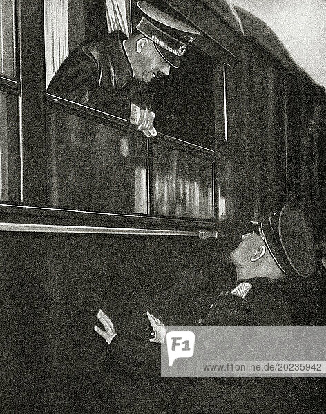 EDITORIAL The meeting of Hitler and Mussolini to celebrate their Pact of Steel  Brenner Pass  18 March  1949. Adolf Hitler  1889 – 1945. German politician  demagogue  Pan-German revolutionary  leader of the Nazi Party  Chancellor of Germany  and Führer of Nazi Germany from 1934 to 1945. Benito Amilcare Andrea Mussolini  1883 – 1945. Italian dictator  journalist  founder and leader of the National Fascist Party (PNF)  and Prime Minister of Italy. From The War in Pictures  First Year.