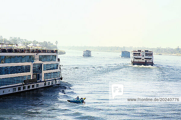 Nile cruise boats with tourist passengers onboard; Egypt