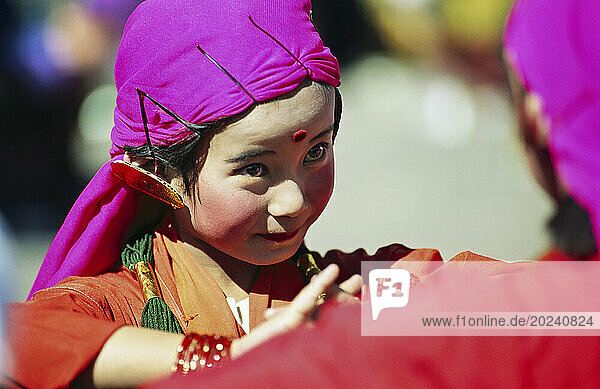 Young girl wearing a traditional Bhutanese costume; Thimphu  Bhutan