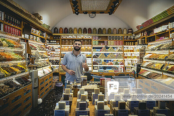 Vendor at a spice shop at Arasta Bazaar in Istanbul; Istanbul  Turkey
