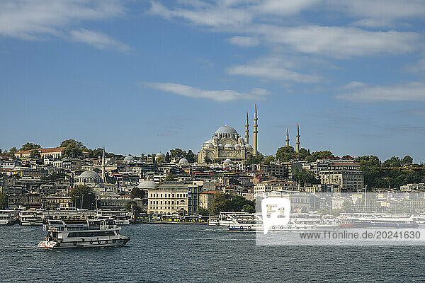 Suleymaniye Mosque on Third Hill with boats on the water in the foreground; Istanbul  Turkey