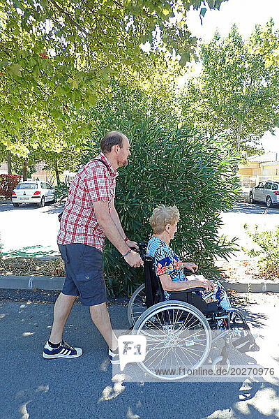 Senior disabled in a wheelchair.