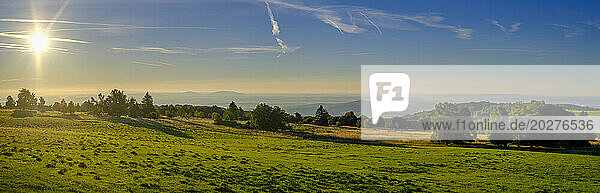Germany  Bavaria  Panoramic view of landscape along High Rhon Road at sunrise