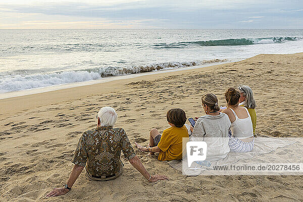 Mexico  Baja  Pescadero  Three generation family on beach
