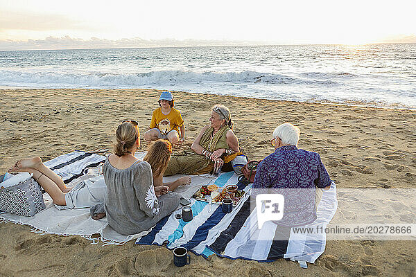 Mexico  Baja  Pescadero  Three generation family having picnic on beach