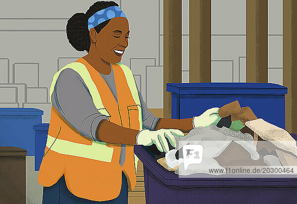 Smiling worker at recycling bins