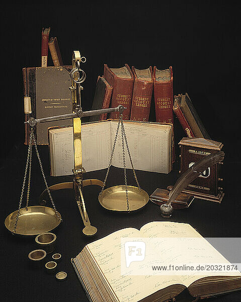 Still life. Gold and Silver Assay Office. Antique scales and accounts ledgers.