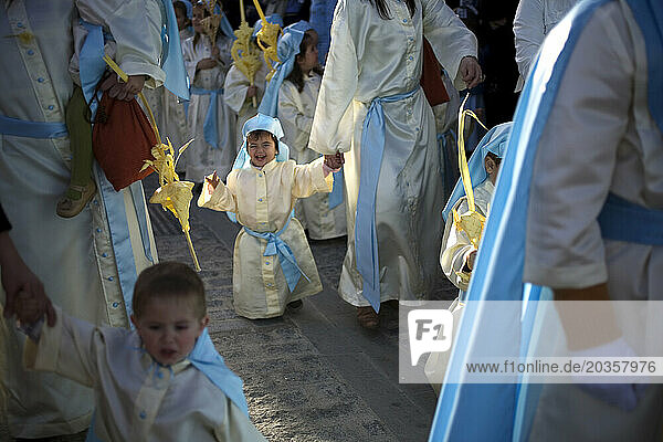 Children participate in a Holy Week procession during Easter celebrations in Prado del Rey  southern Spain's Cadiz Sierra region