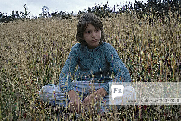 Boy in Pampas grass - Patagonia  Argentina