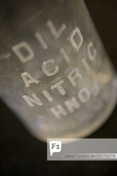 Nitric acid bottle.