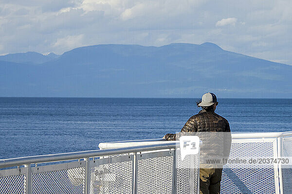 Man on sailing ferry  Tofino  British Columbia  Canada