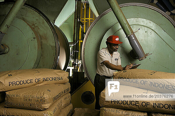 Worker in a coffee factory.