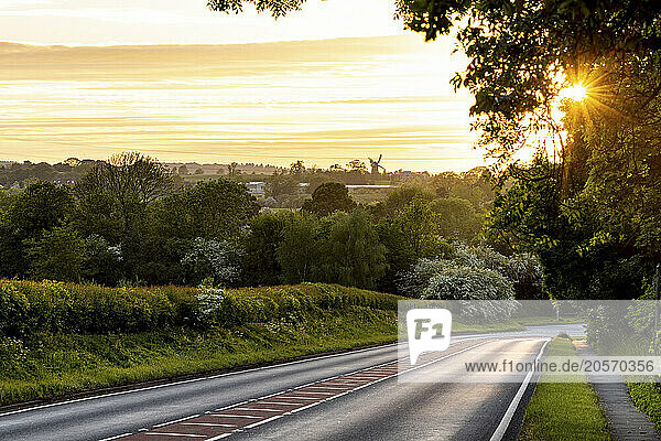 Empty country road at sunset in UK