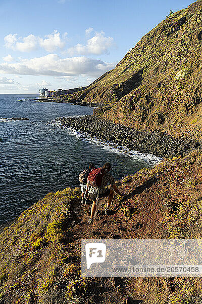 Friends hiking on Pico de Teide in Tenerife of Canary Island