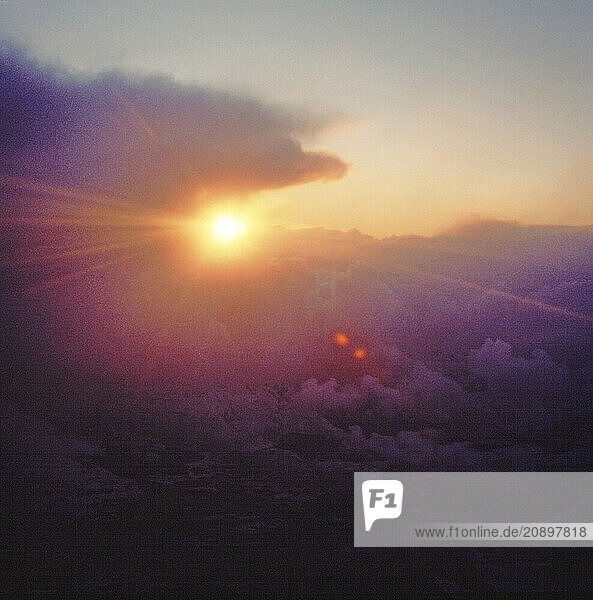 UK. England. Aerial view of sunrise over industrial town.