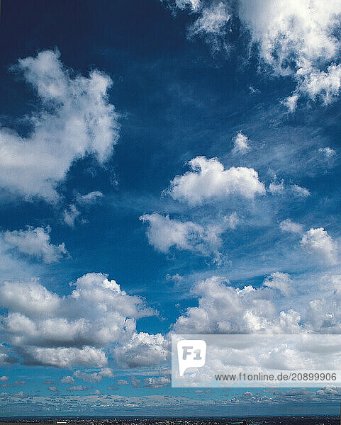 Australia. Sydney. Westerly view of blue sky with stratocumulus clouds.