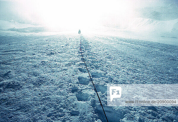 China. Tibet Region. Himalayas. Mount Everest. Climber in distance.