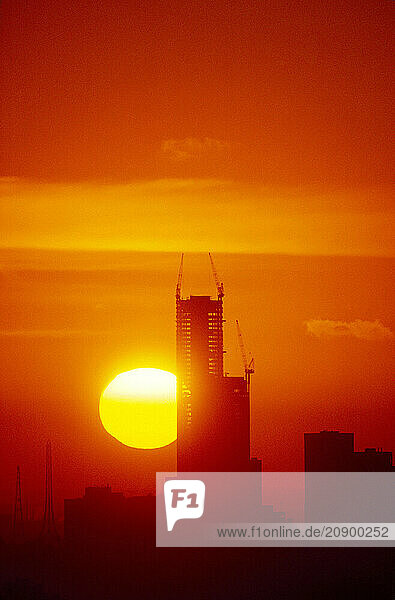 Australia. Melbourne. New skyscraper buildings construction at sunset. Photo 1985.